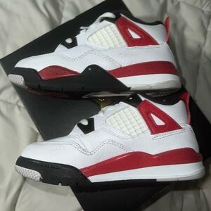 Jordan Red and White Sneakers with High-Top Design and Bold Accents